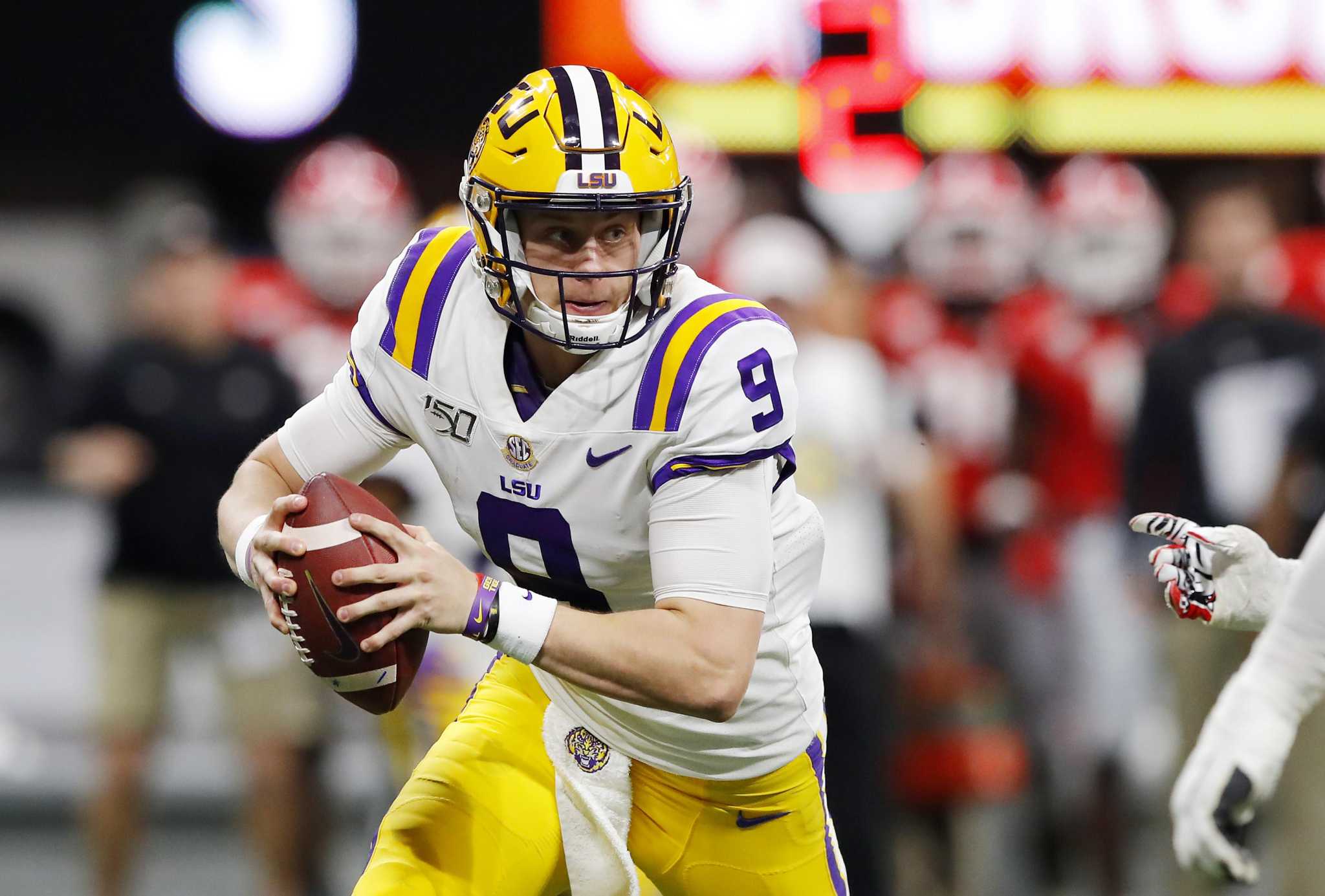 LSU's Joe Burrow throws 4 TDs in SEC title win over Georgia - Sports  Illustrated