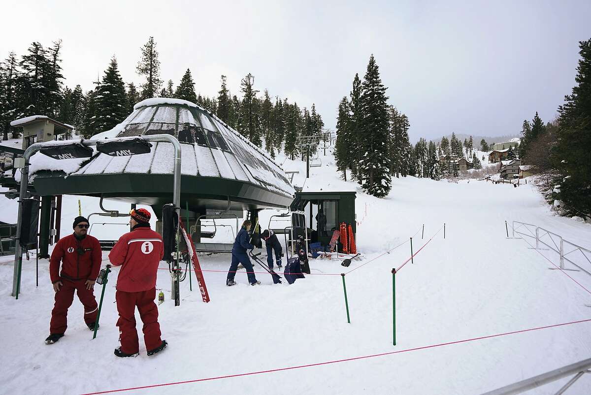 In this photograph provided by Heavenly Mountain Resort, ski lifts are prepared at Heavenly Mountain Resort Saturday, Dec. 7, 2019, in South Lake Tahoe, Calif. A winter storm brought strong wind along with heavy rain and snow across Northern California on Saturday. (Cody Blue/Heavenly Mountain Resort via AP)