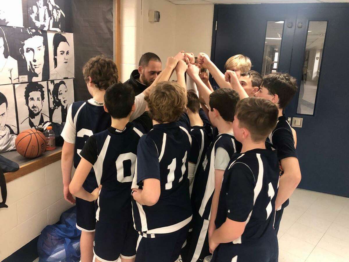 The Wilton boys seventh grade team gathers before one of its games last weekend.