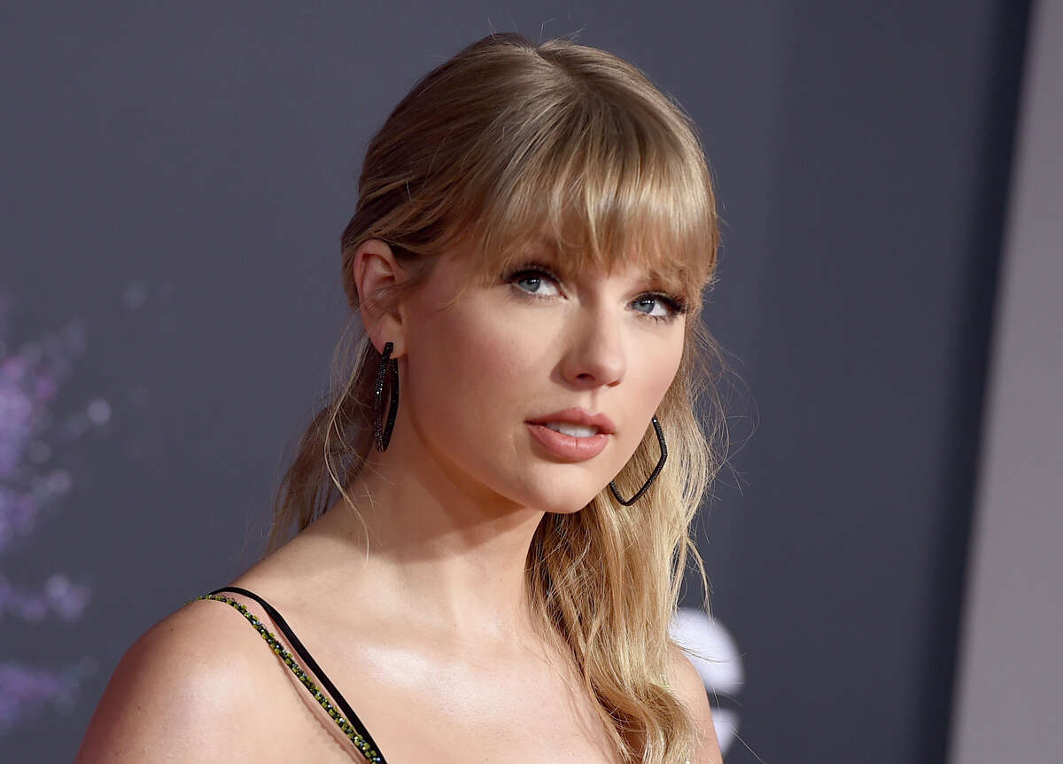 FILE - This Nov. 24, 2019 file photo shows Taylor Swift at the American Music Awards in Los Angeles. A documentary on Swift will kickoff the next Sundance Film Festival. (Photo by Jordan Strauss/Invision/AP, File)