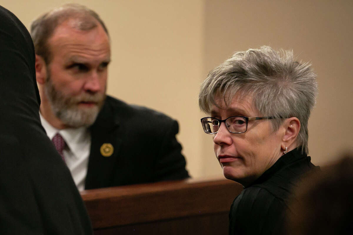 Allison Steele, mother of Cayley Mandadi, looks away as she talks with Prosecutor David Lunan before Visiting Judge Raymond Angelini presiding declared a mistrial in the murder trial of Mark Howerton, who was accused of killing 19-year-old Cayley Mandadi in 2017, in the 144th state District Court of the Cadena-Reeves Criminal Justice Center in San Antonio, Texas, on Dec. 12, 2019.