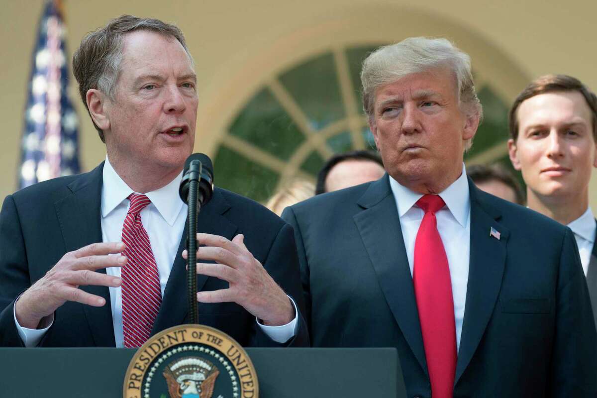 Trade Rep. Robert Lighthizer next to US President Donald Trump. The administration and Democrats found a rare agreement when it came to the United States Mexico Canada Agreeement.