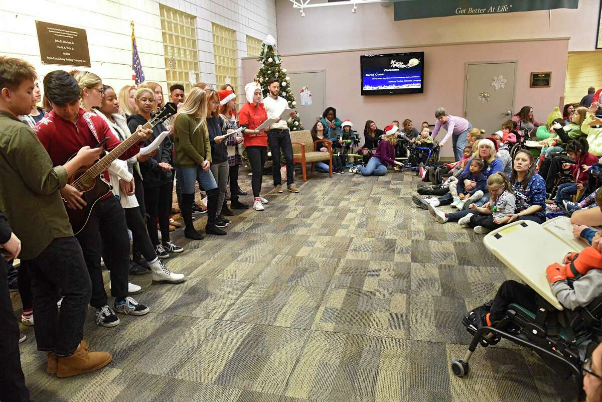 photos-albany-police-bring-holiday-cheer-to-center-for-disability-services