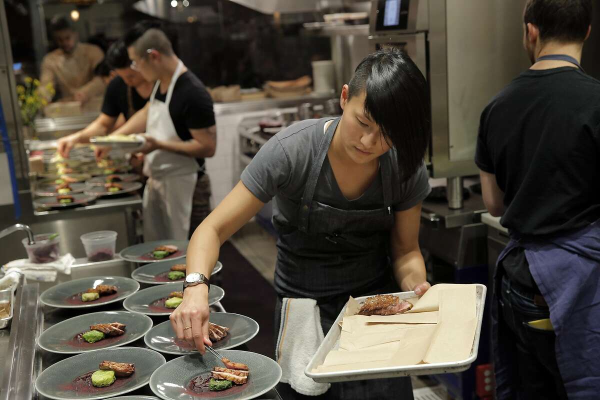 Chefs Melissa King prepares the Sonoma Liberty Duck dish on Monday. Top Chef contestants Melissa King and Mei Lin held a pop up restaurant event at Nico restaurant in San Francisco, Calif., on Monday, January 12, 2015, to showcase the pair's skills and build their brand. Rather than open a restaurant of her own, Melissa King has taken to making herself known in the culinary world by doing private meals and events like the pop up for press, friends, and the public willing to share her story.