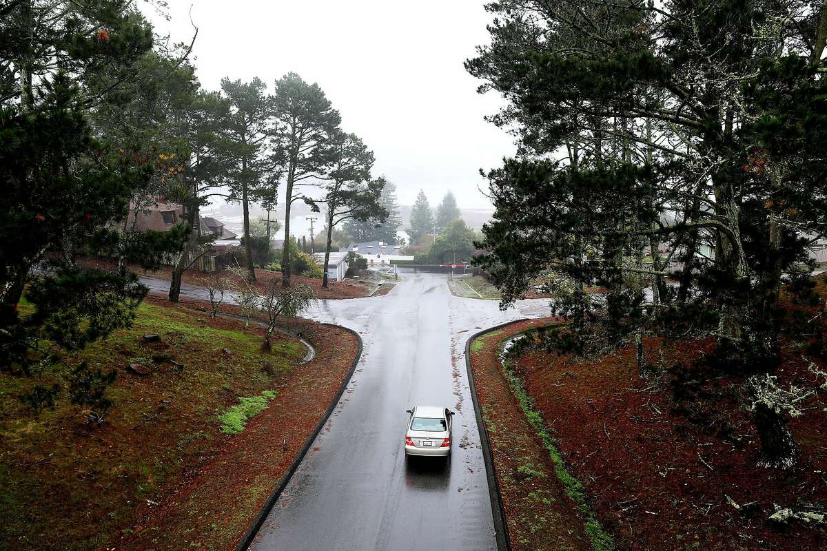 A car travels along Herring Drive on the Strawberry Seminary campus in Mill Valley, Calif., on Wednesday, December 11, 2019. There's a proposal to convert the seminary to housing as well as an Oxford University campus.