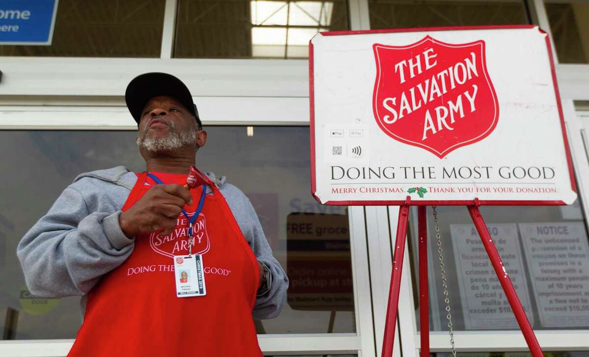 The Salvation Army's red kettle bells ring outside Kroger this holiday  season