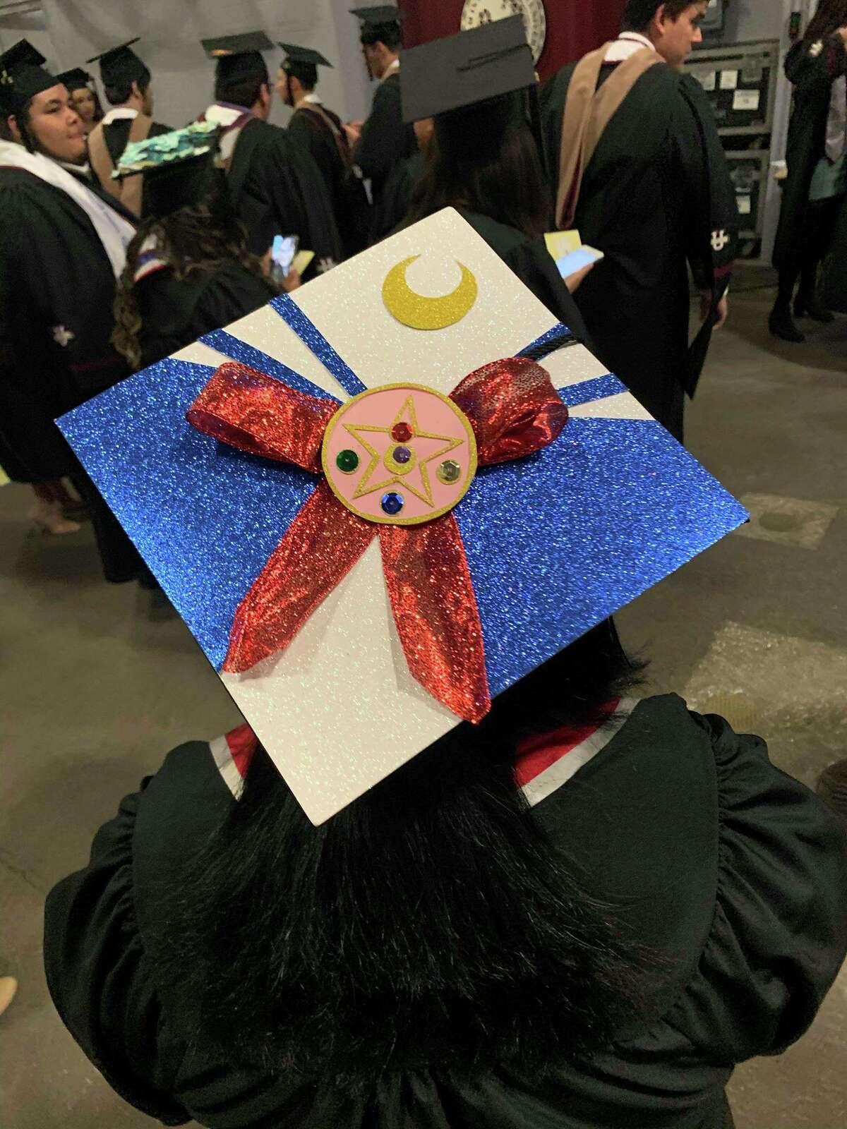 TAMIU graduates decked out their caps for the Summer and Fall Commencement ceremony at the Sames Auto Arena.