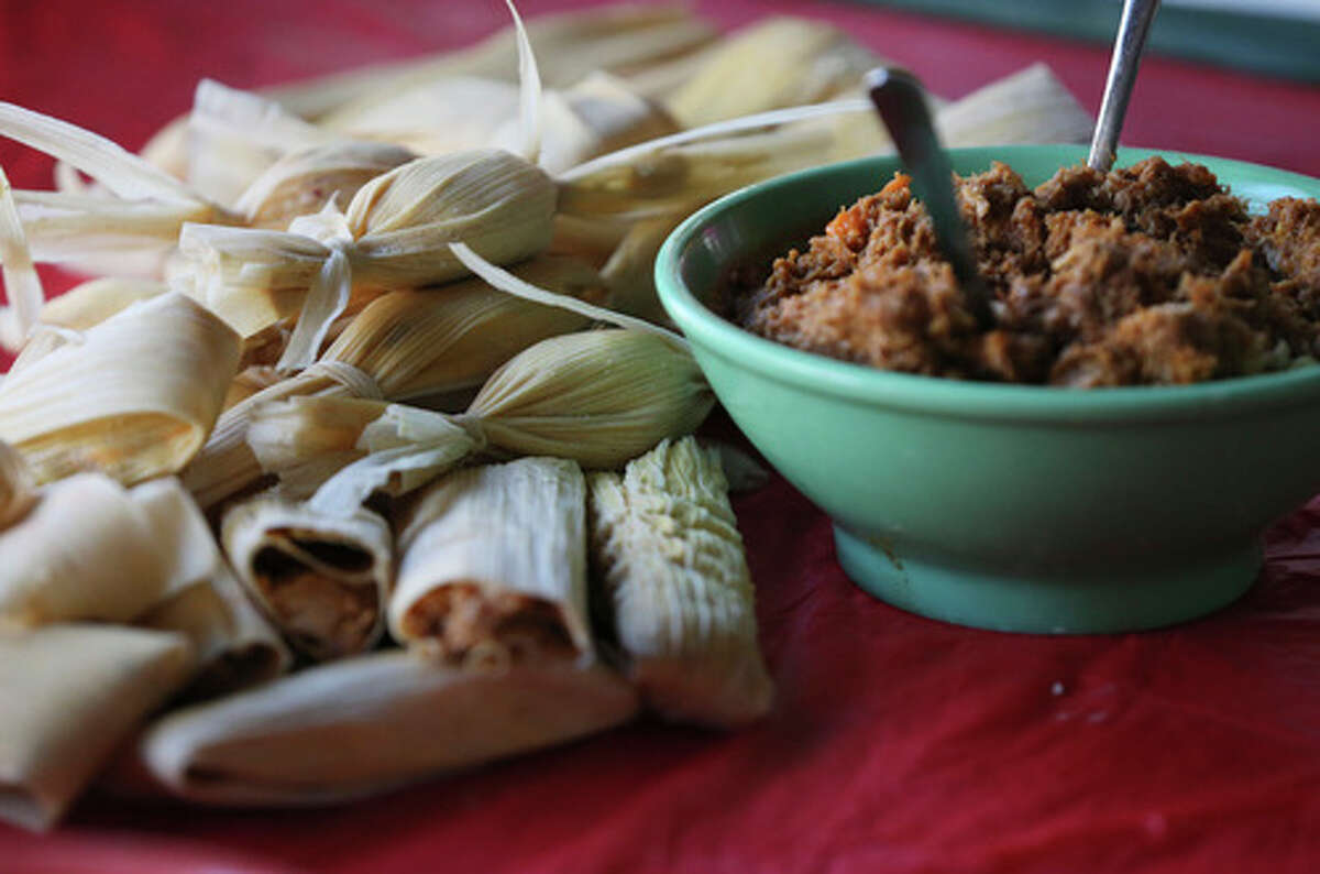 Some of the finished tamales are seen as locals learn how to make tamales and participate in other holiday-themed events as part of this year's La Gran Tamalada at Market Square on Saturday, Dec. 14, 2019.