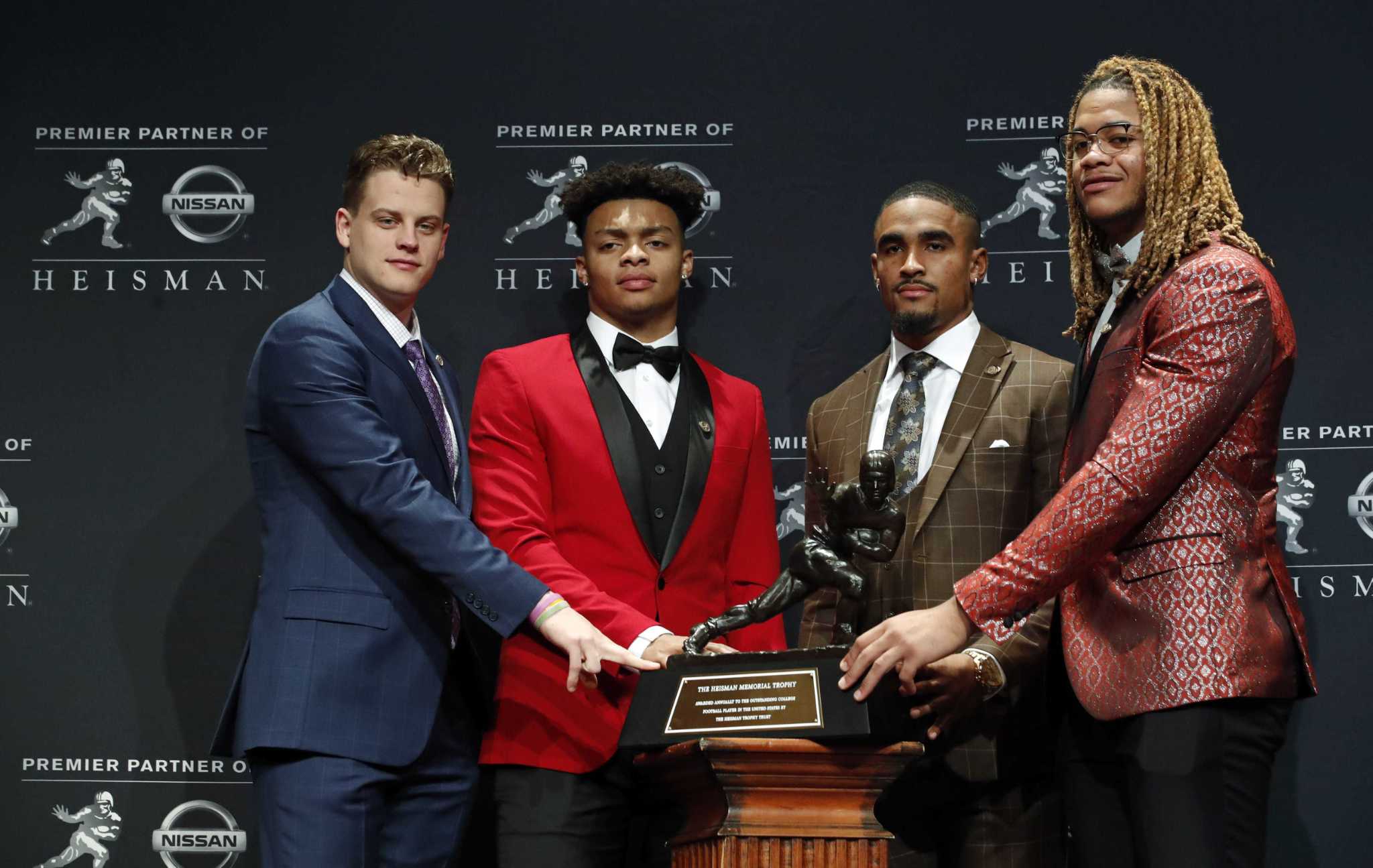 Louisiana State University quarterback Joe Burrow shakes hands