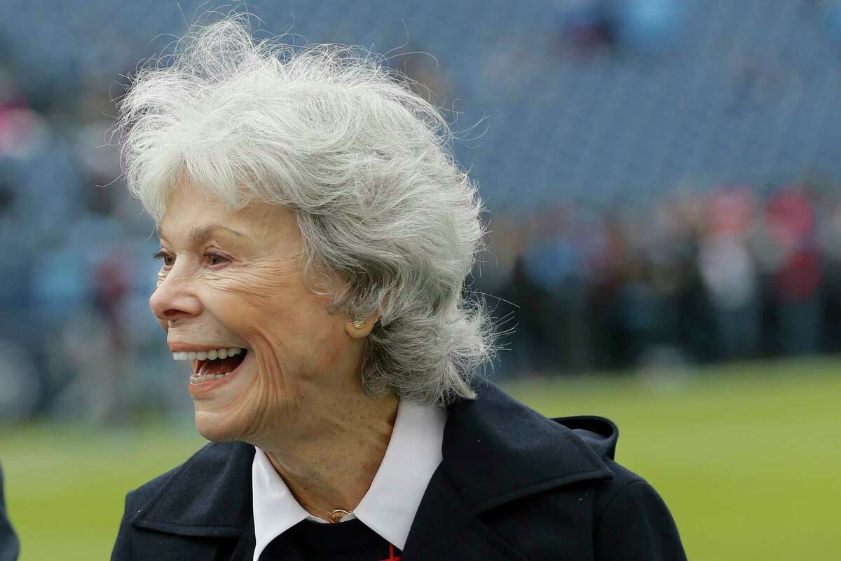 Houston Texans co-founder and chair Janice McNair laughs on the sidelines before an NFL football game against the Tennessee Titans at Nissan Stadium on Sunday, Dec. 15, 2019, in Nashville.