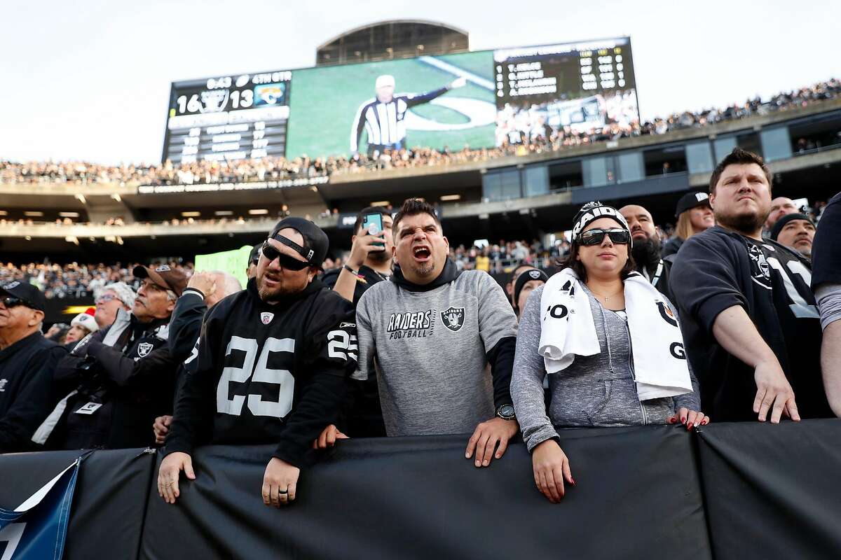 Oakland Raiders' fans react to a roughing the passer penalty in final minute of Jacksonville Jaguars' 20-16 win during Raiders' final game at Oakland Coliseum in Oakland, Calif., on Sunday, December 15, 2019.