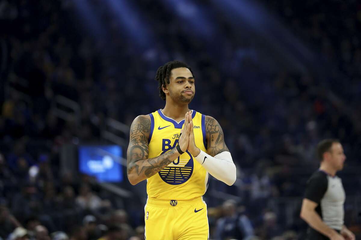 Golden State Warriors guard D'Angelo Russell (0) looks on during the first half of an NBA basketball game against the Sacramento Kings in San Francisco, Sunday, Dec. 15, 2019. (AP Photo/Jed Jacobsohn)