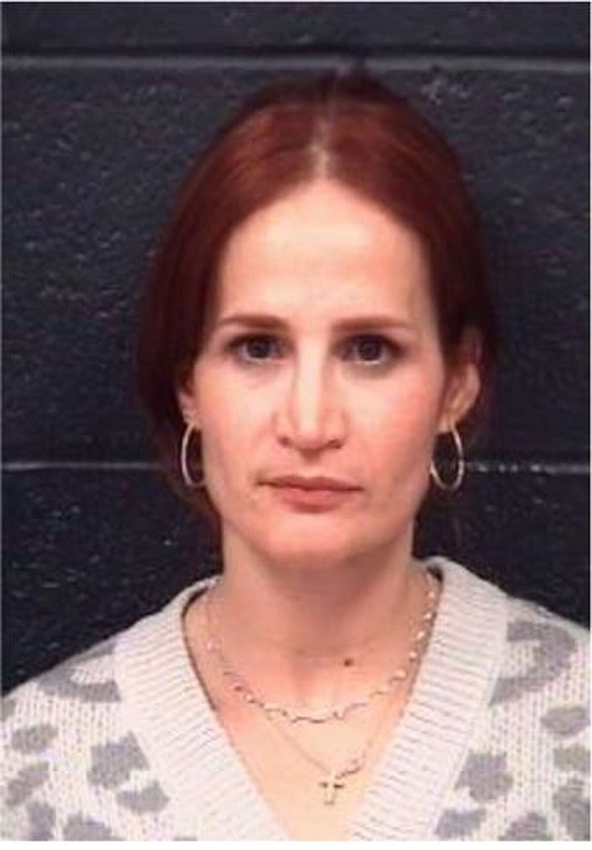 Martha Veronica Riddle was charged with driving while intoxicated.