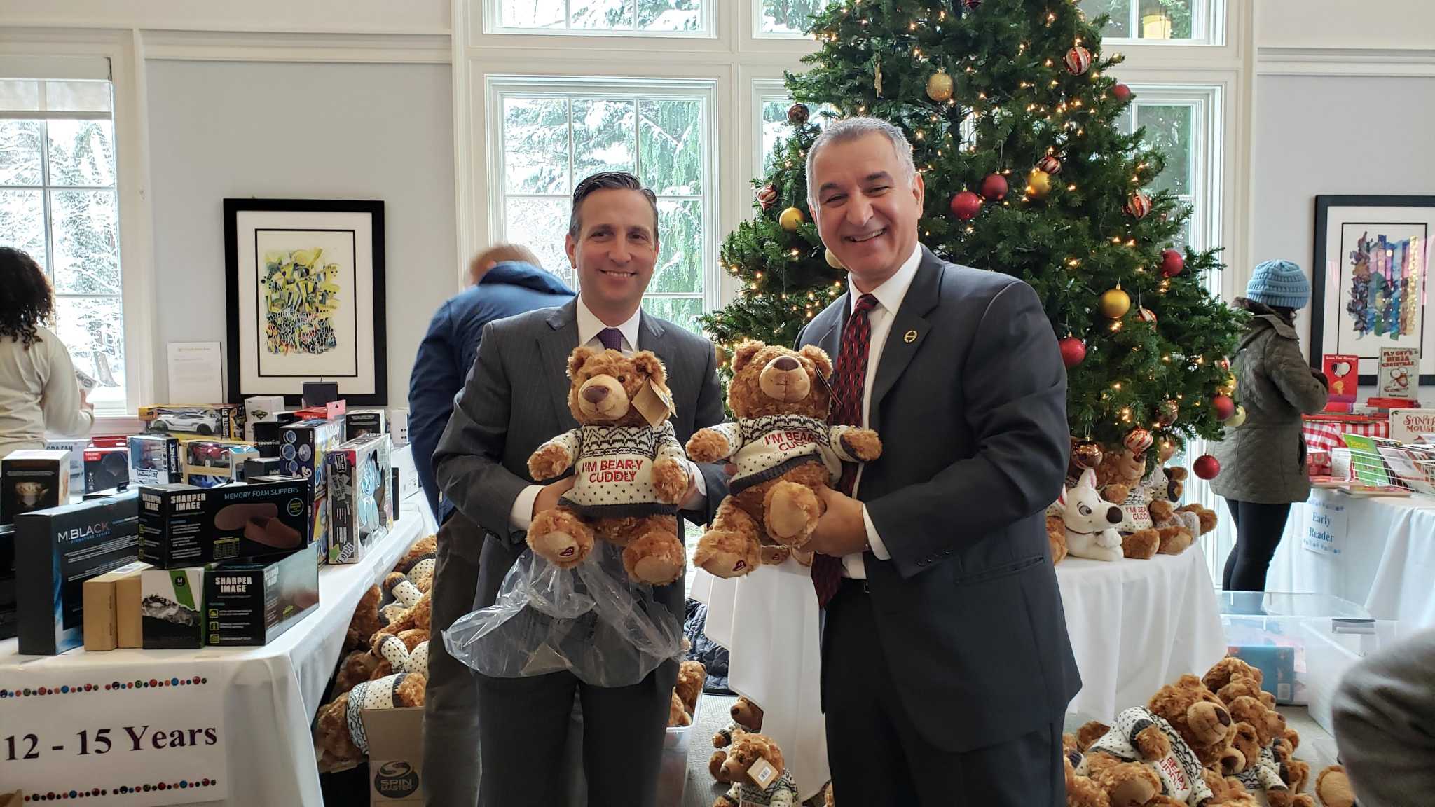 Darien nonprofit gives toys to families in need during holidays