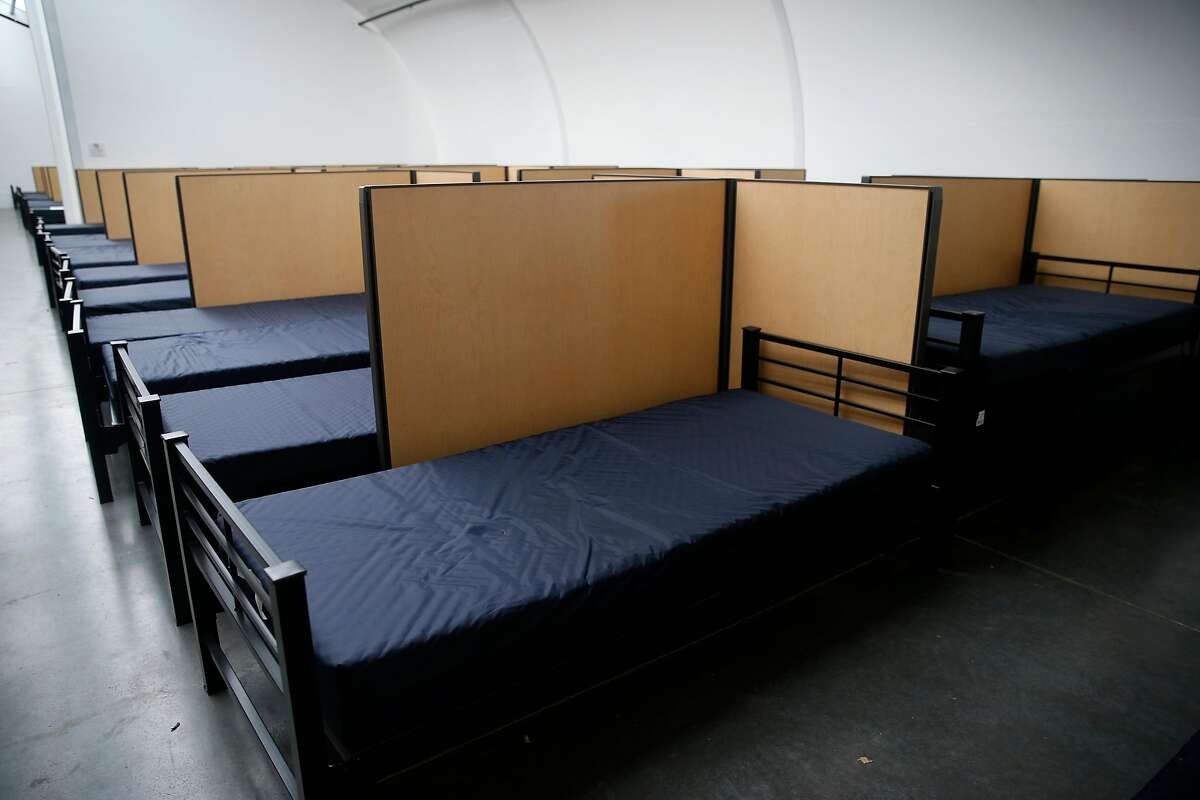 Beds and partitions are already in the dormitories as construction is nearing completion on the homeless navigation center on The Embarcadero in San Francisco, Calif. on Thursday, Dec. 12, 2019.