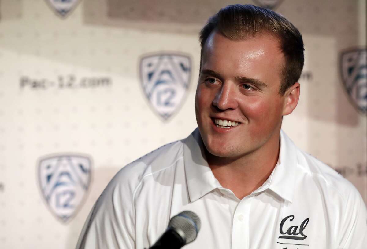 FILE - In this July 24, 2019, file photo, California linebacker Evan Weaver answers questions during the Pac-12 Conference NCAA college football Media Day, in Los Angeles. Weaver was selected to The Associated Press All-Pac 12 Conference team and named Pac-12 Defensive Player of the Year, Thursday, Dec. 12, 2019. (AP Photo/Marcio Jose Sanchez, File)