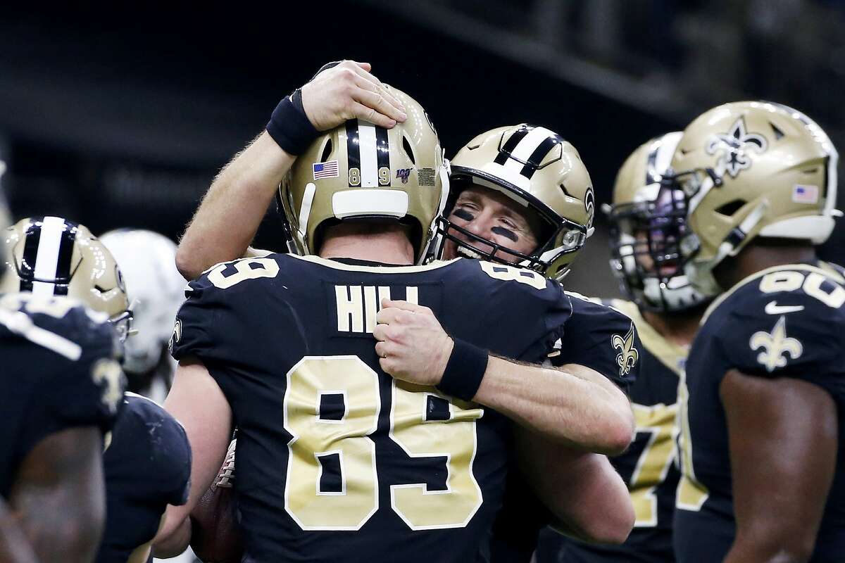 New Orleans Saints tight end Taysom Hill (7) celebrates after a