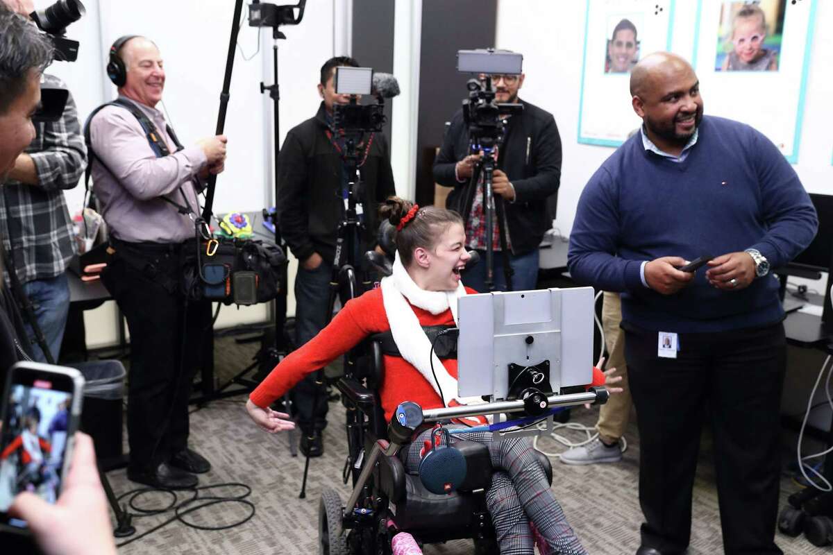 Alexis Mendoza, 23, tries out the new Comcast X1 Eye Control Technology on Tuesday, Dec. 10, at Easter Seals Greater Houston. The technology allows people with disabilities to be able to operate their TVs with the gaze of an eye.