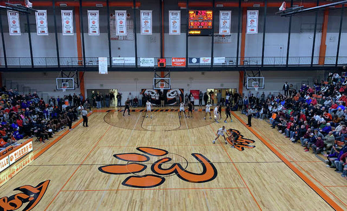 Action from the Morgan Park-Collinsville game in front of a large crowd at Lucco-Jackson Gymnasium inside Edwardsville High School on Saturday.