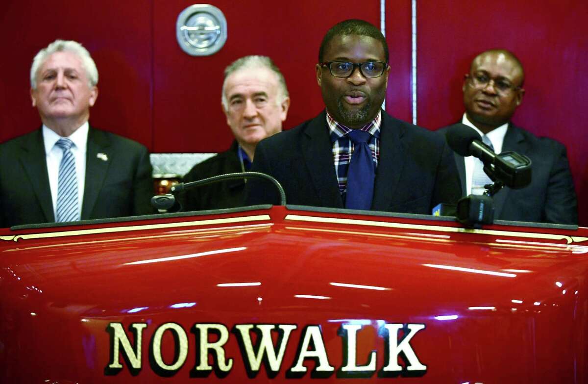 Norwalk Chief of Community Services Lamond Daniels speaks as the city announces the Norwalk Fire Department will join the new State of Connecticut Firefighter Testing Consortium for fire department hires during a press conference Tuesday, December 17, 2019, at department headquarters in Norwalk, Conn. 