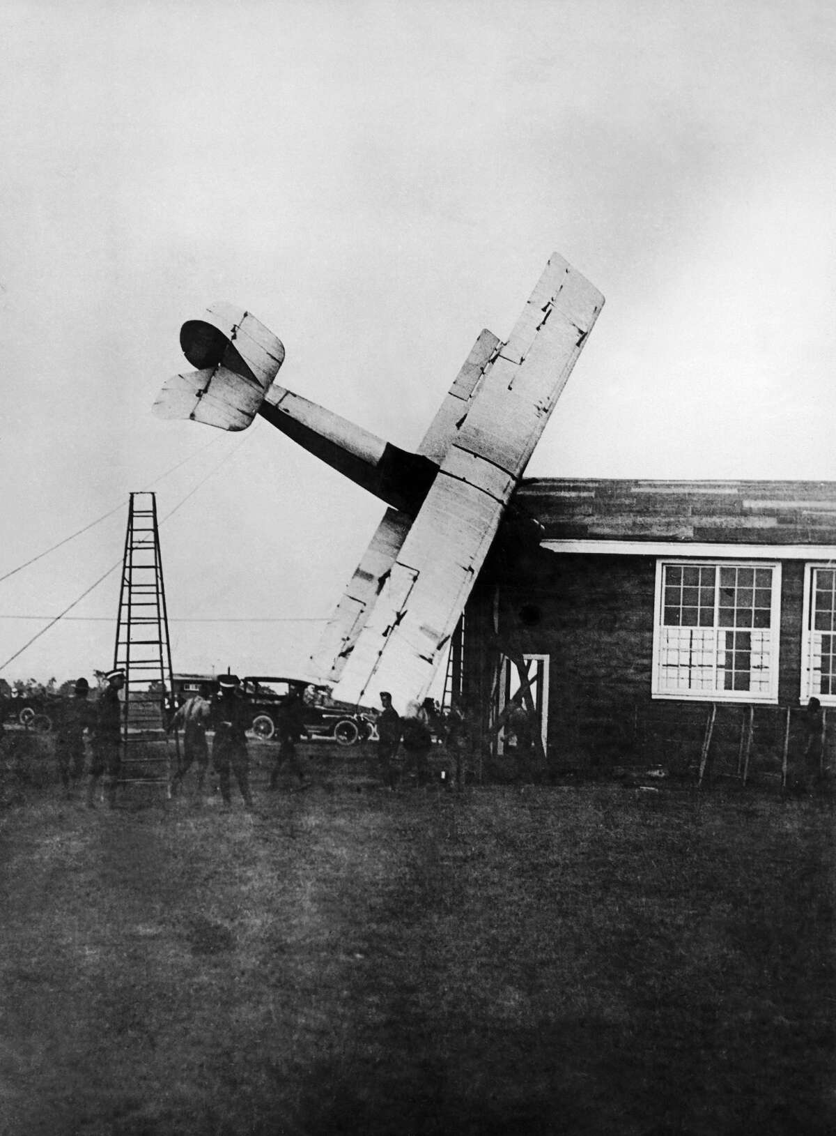 A photographer captures an airplane crash on May 4, 1919, in Texas.