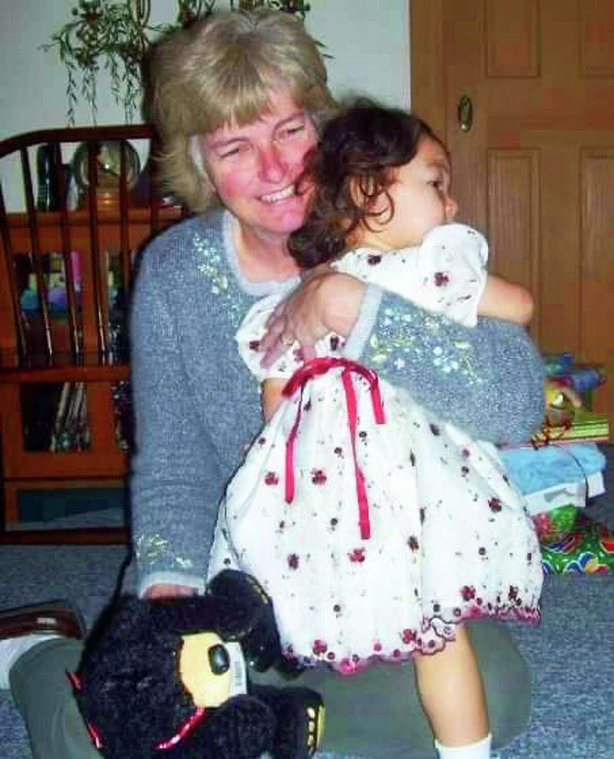 Colleen Watrous cuddles up to her granddaughter Alaina Watrous.