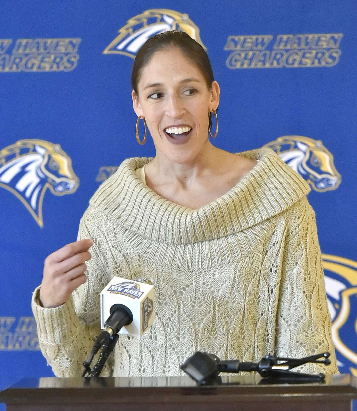 West Haven, Connecticut - Tuesday, December 10, 2019: Rebecca Lobo, former University of Connecticut Basketball player and the Hartford HealthCare Courage Award Ambassador, speaks during a ceremony honoring Chris Liggio, a University of New Haven Football player, who was presented with the Hartford HealthCare Connecticut Courage Award during a ceremony Tuesday at the University of New Haven in West Haven. The Hartford HealthCare Connecticut Courage Award is presented every month to two inspiring Connecticut college student-athletes who have demonstrated courage in the face of adversity.