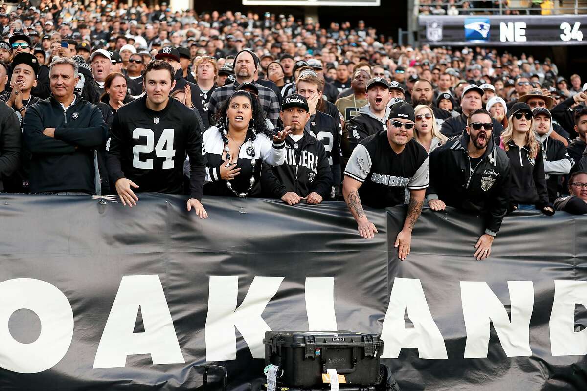 Oakland Raiders' fans watch winning drive by Jacksonville Jaguars during Jaguars' 20-16 win during Raiders' final game at Oakland Coliseum in Oakland, Calif., on Sunday, December 15, 2019.