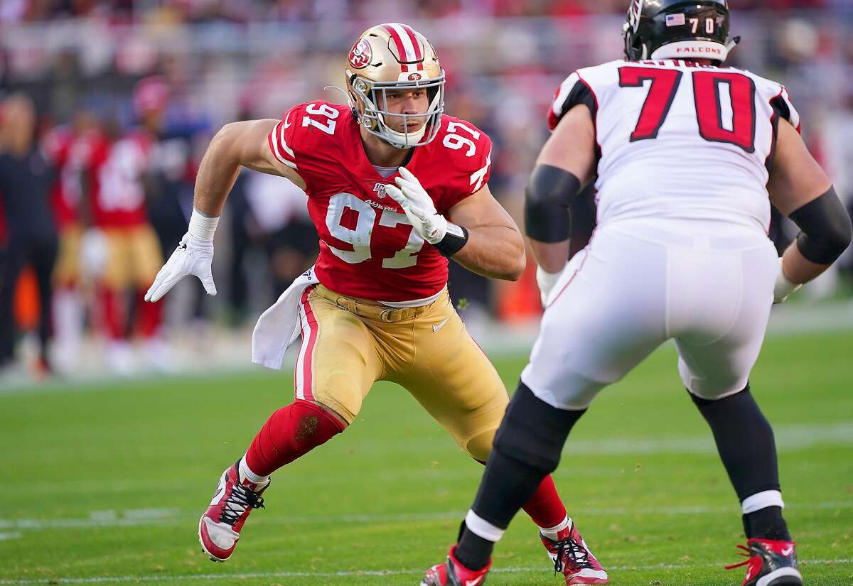 Nick Bosa of the San Francisco 49ers looks to rush past Jake Matthews of the Atlanta Falcons during the second half of an NFL football game at Levi's Stadium on Dec. 15, 2019.