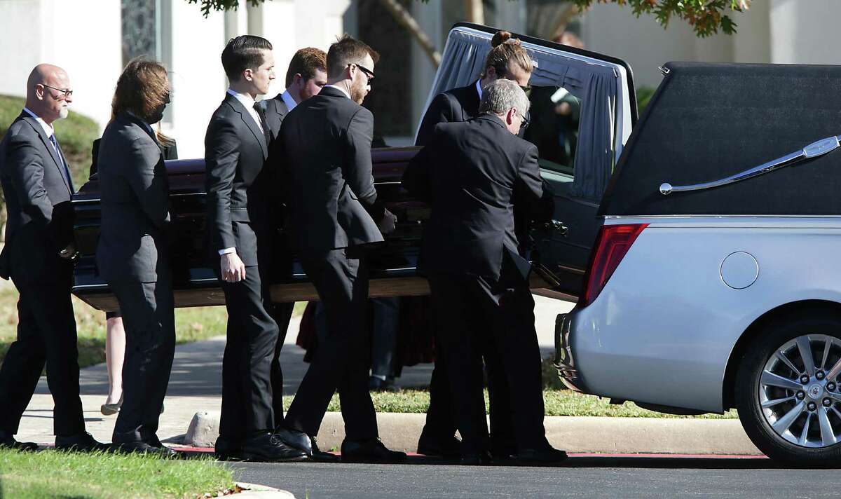 Pallbearers carry Charline McCombs to the hearse following the memorial service for McCombs at Alamo Heights United Methodist Church.