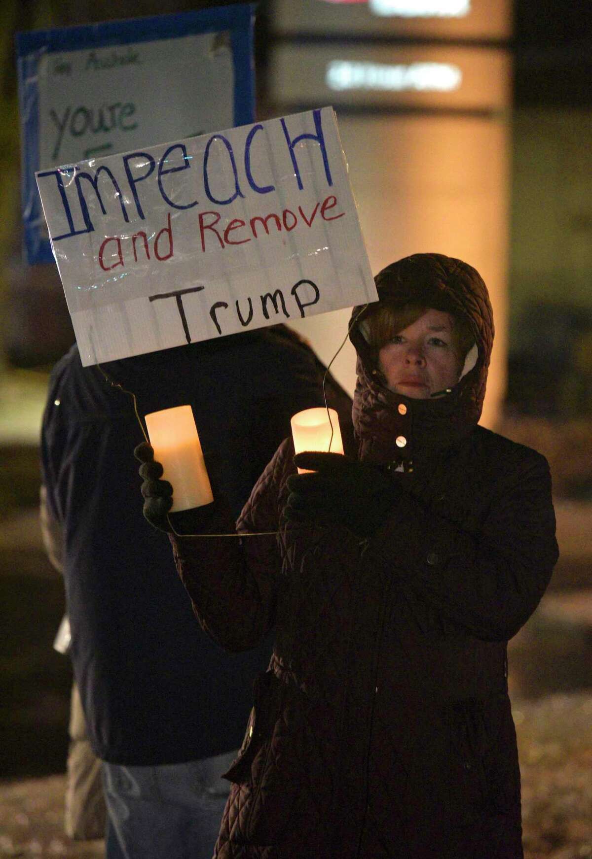 Maureen Tyra, of Bethel, joined community members rallying for the impeachment of President Trump.