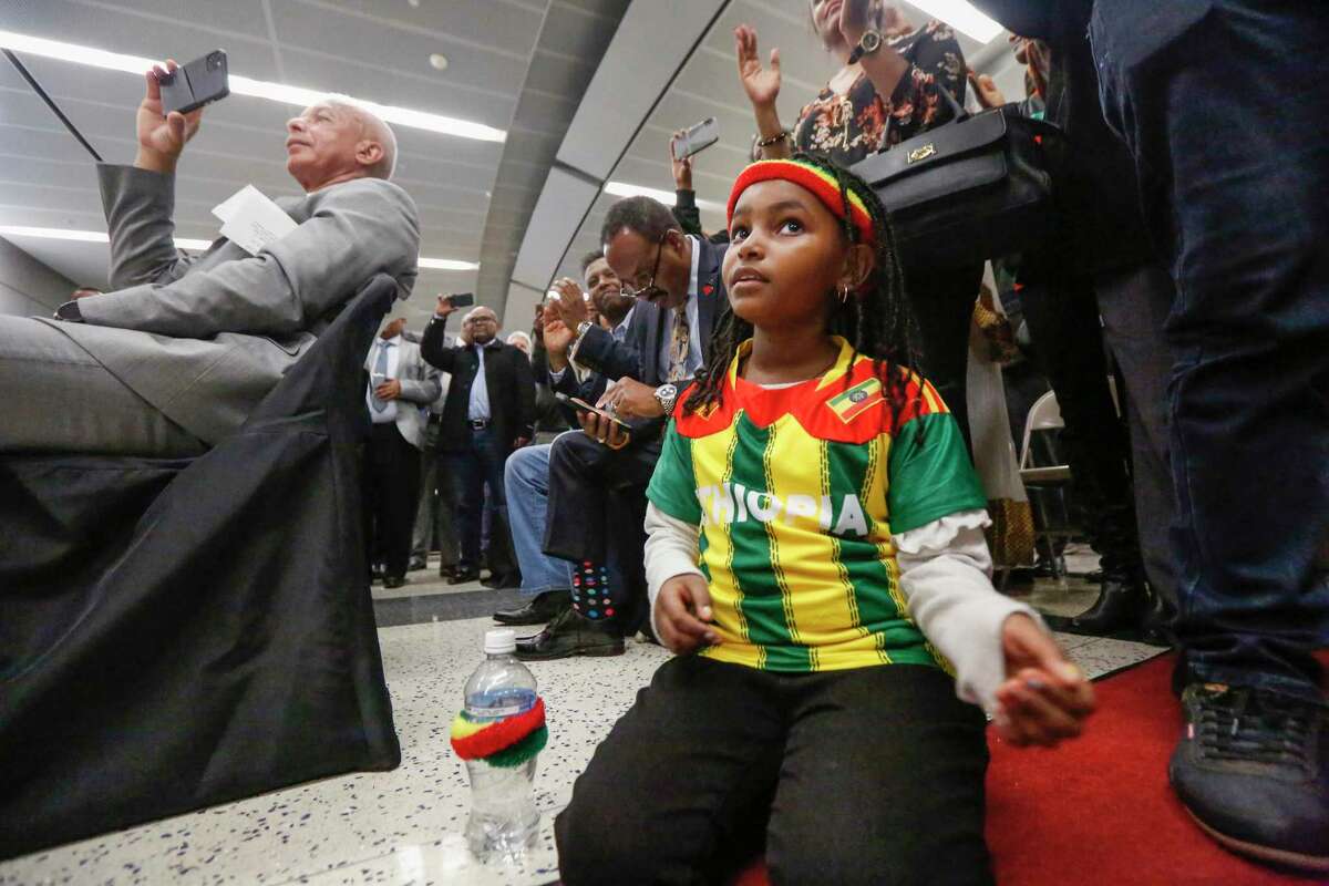 Meklit Ashagace, 8, originally from Ethiopia but now lives in Houston enjoyed dancers after the Ethiopian Airlines debut nonstop flight to Bush Intercontinental Airport arrived Monday, Dec. 16, 2019, in Houston.