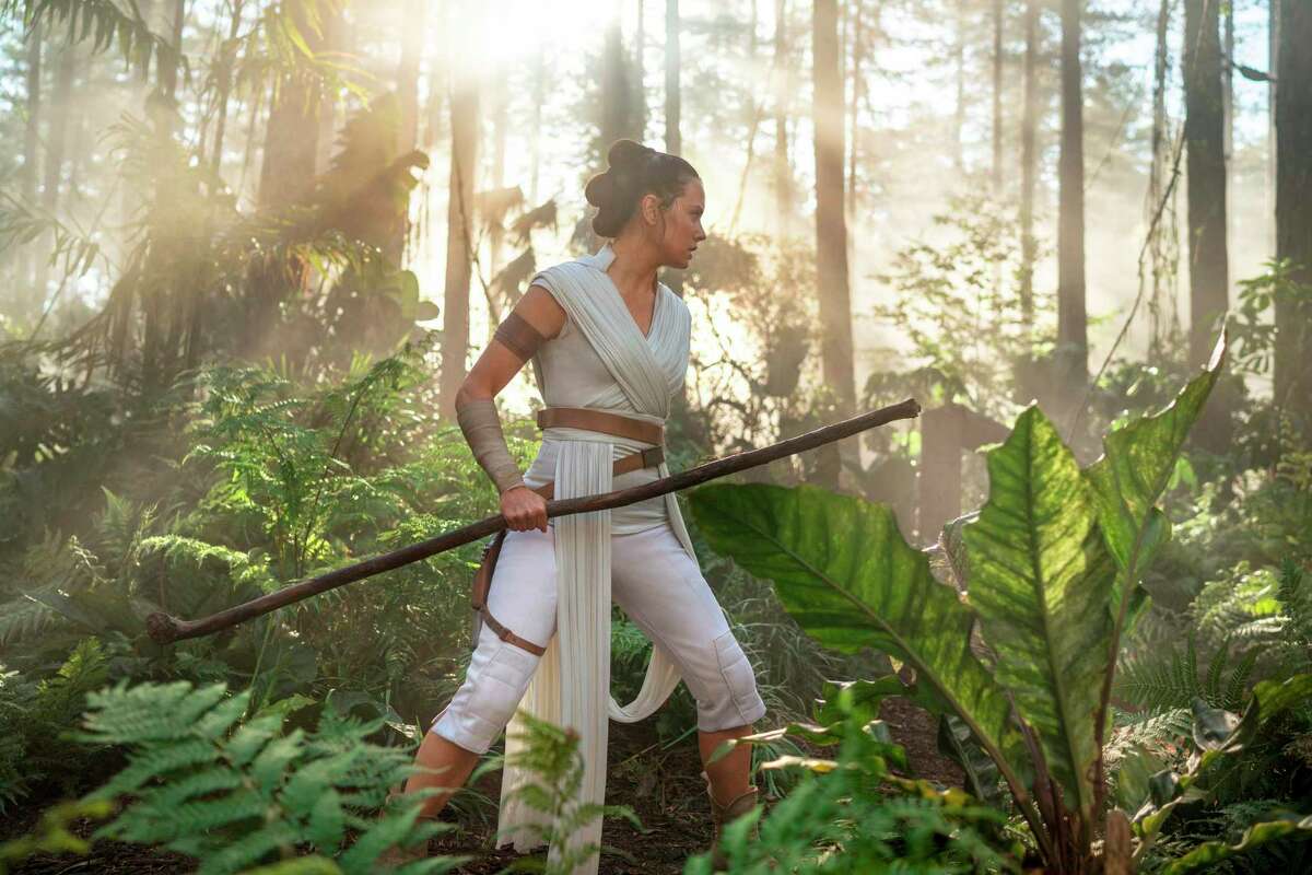 This image released by Disney/Lucasfilm shows Daisy Ridley as Rey in a scene from "Star Wars: The Rise of Skywalker." (Jonathan Olley/Disney-Lucasfilm Ltd. via AP)