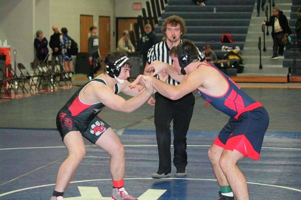 Reed City's Noah Morgan (left) takes on Big Rapids' Michael Mills in wrestling action last week. (Herald Review photo/John Raffel)