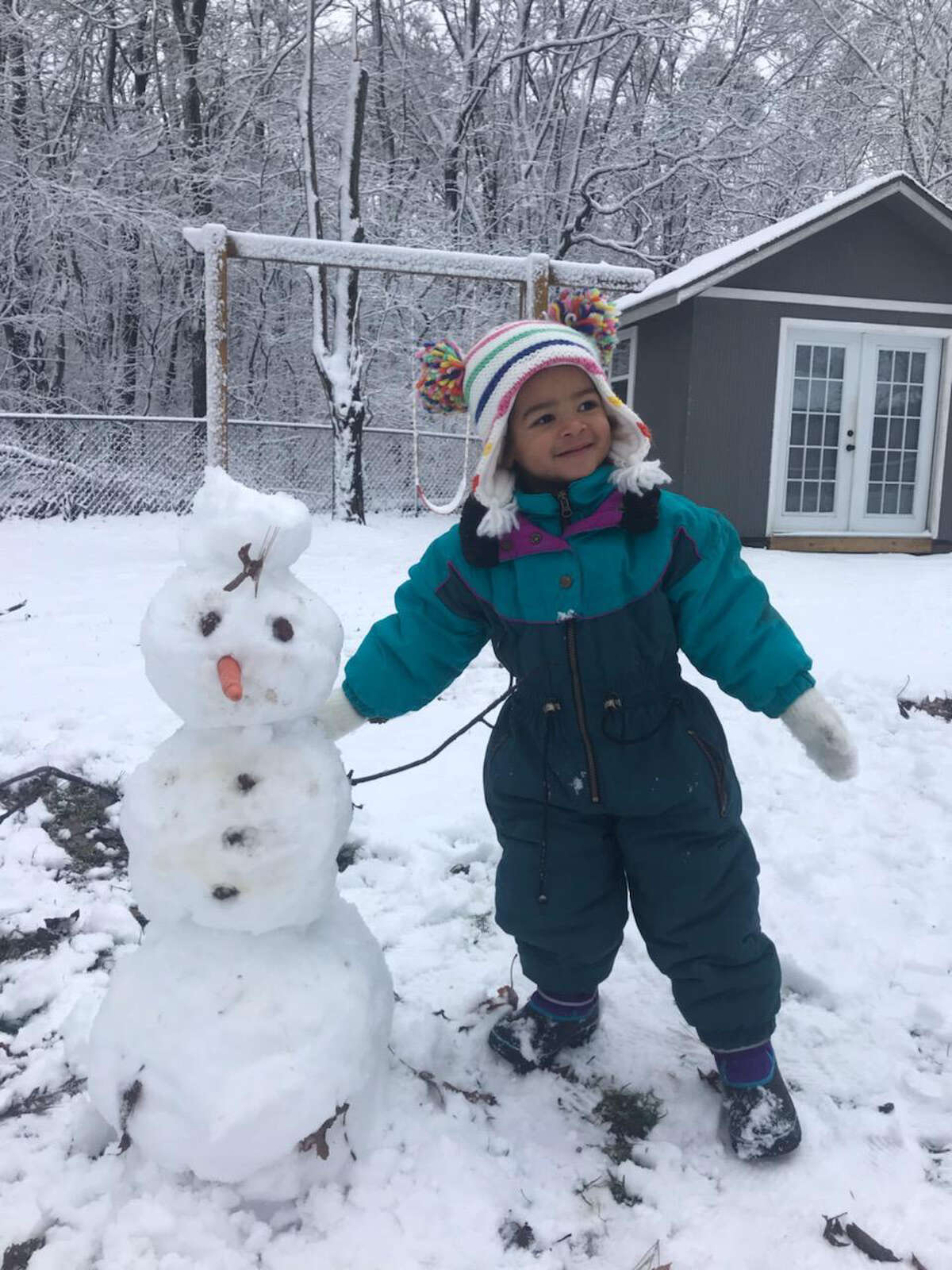 "Zola built a snowman for Grampa & Grama – Bob & Laura Fisher!" Zola