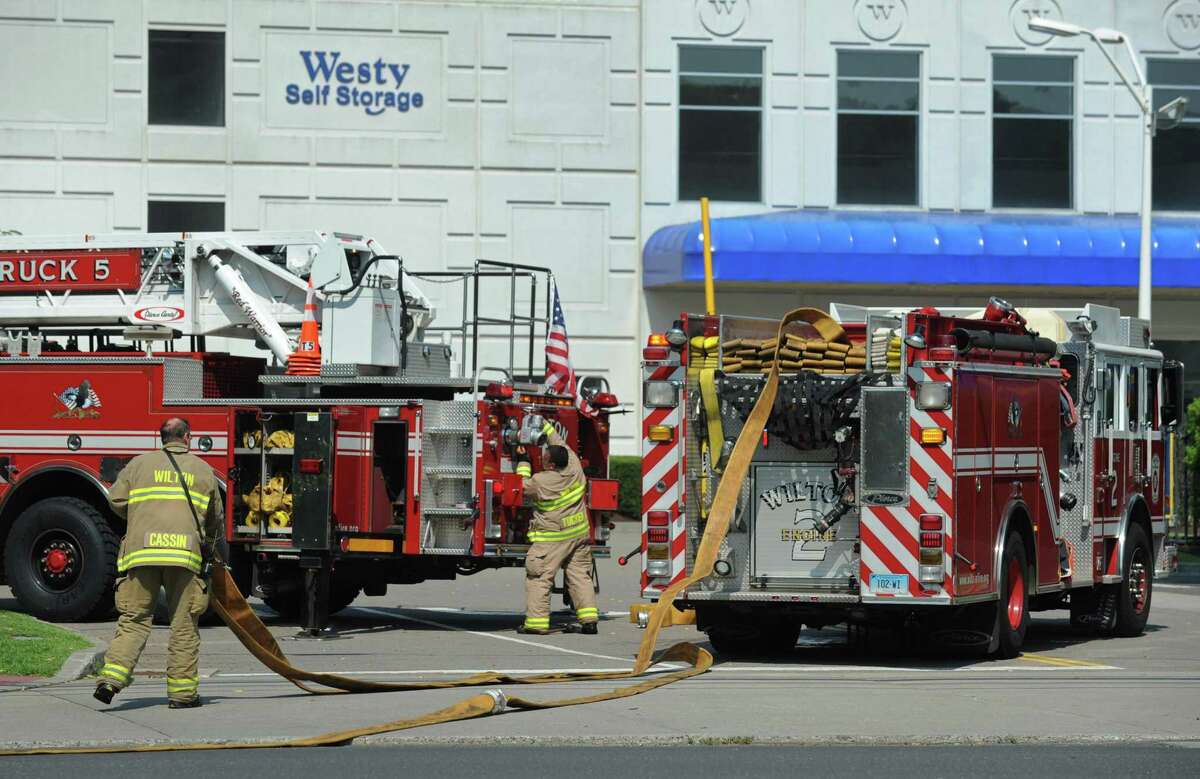 Wilton Fire Engine 2, right, is one of two fire trucks nearly ready to be retired. The town will purchase a