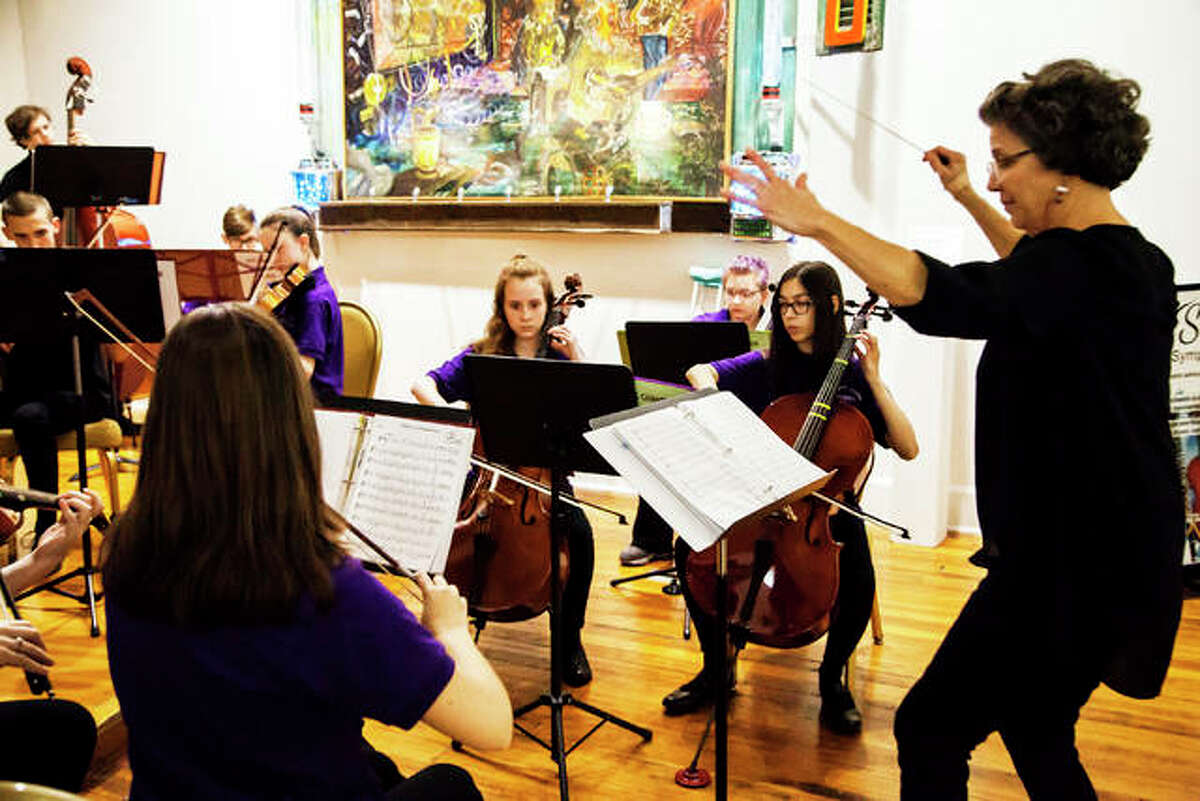 The Alton Youth Symphony Chamber Group performs at Jacoby Arts Center in Alton during the “Art is Inspirational” exhibition opening on Dec. 5.