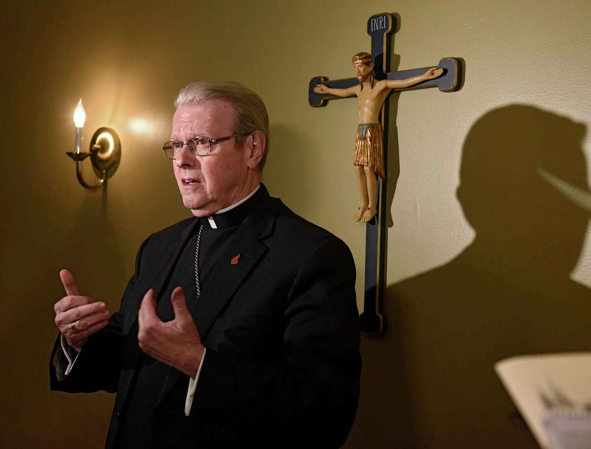 Bishop Edward Scharfenberger is interviewed by the press ahead of a prayer service for sex abuse survivors at the Cathedral of the Immaculate Conception in Albany, N.Y. on Wednesday, Dec. 18, 2019. (Lori Van Buren/Times Union)