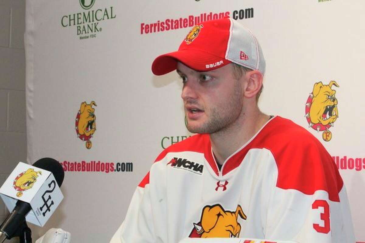 Austin Shaw answers questions at a press conference following Saturday's game. (Pioneer photo/John Raffel)