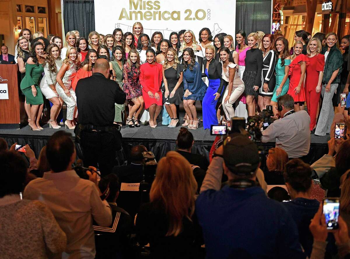 FILE - In this Thursday, Dec. 12, 2019, file photo, candidates for Miss America 2020 pose for a group photo during the official Arrival Ceremony for the Miss America 2.0 competition at Mohegan Sun. Miss America will be crowned for the first time at a tribal casino in Connecticut on Thursday, Dec. 19, 2019. (Sean D. Elliot/The Day via AP, File)