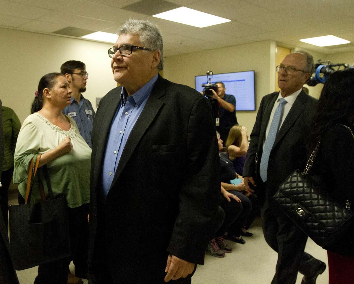 Former priest Manuel La Rosa-Lopez walks toward the 435th state District Court of Judge Patty Maginnis for a hearing, Thursday, Sept. 26, 2019, in Conroe.