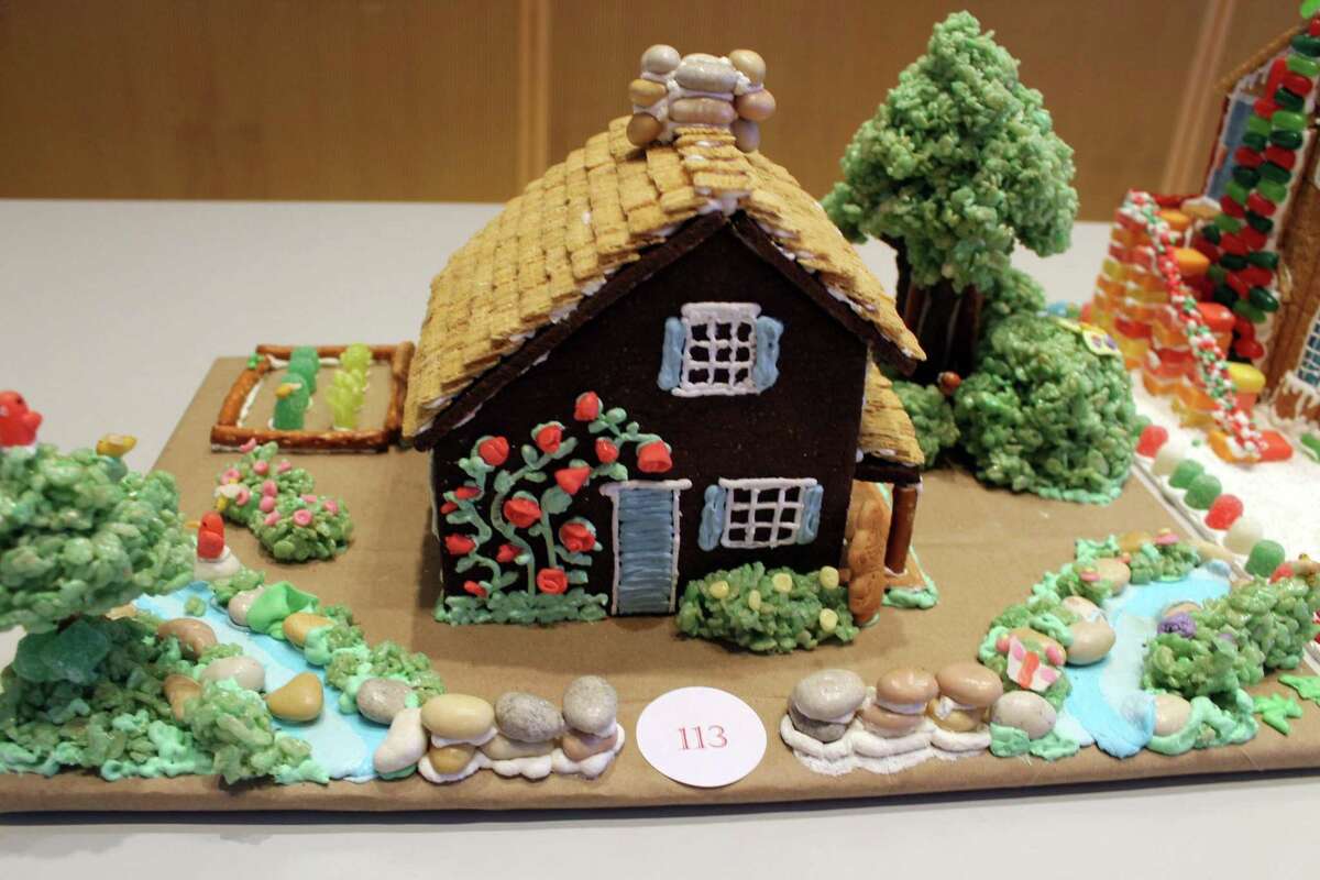 Tina Duncan won an award for Most Visionary Wilton Place in the "How Sweet It Is in Wilton" gingerbread house contest held at Wilton Library.