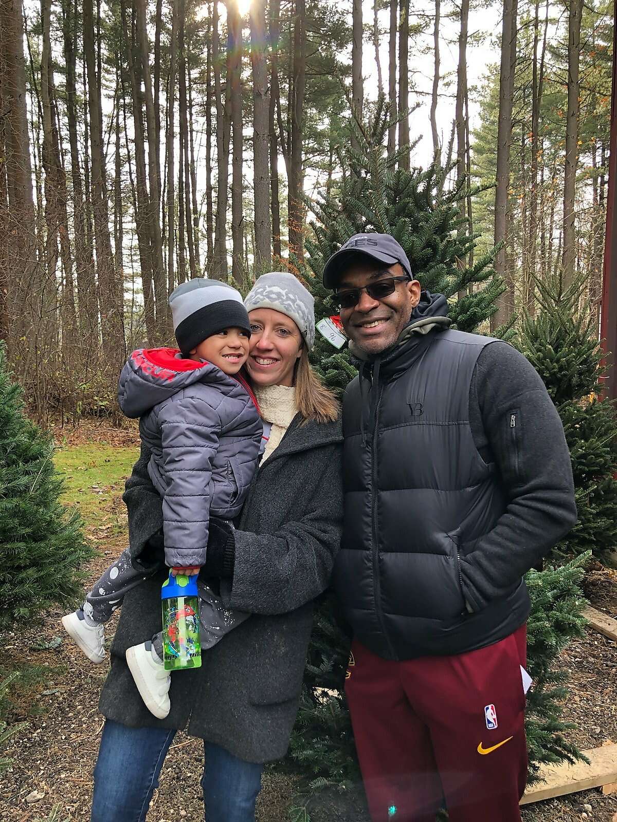 Cleveland Cavs Assistant Coach Lindsay Gottlieb with her husband Patrick Martin and her son Jordan on November 30, 2019.