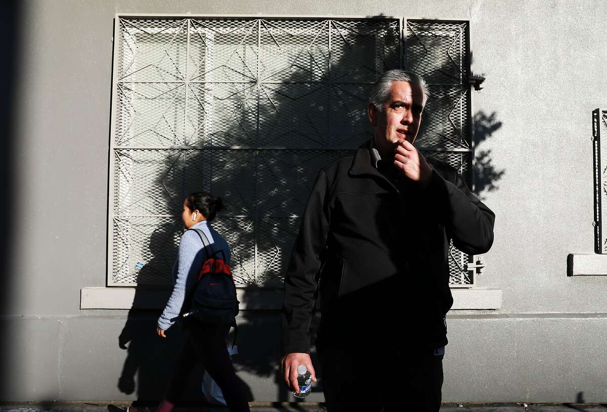 Thomas Wolf, 49, a case manager at Salvation Army, speaks to The Chronicle as he stands on Hyde St. in San Francisco, Calif., on Tuesday, November 19, 2019. Wolf was an employed father of two, husband and homeowner in Daly City before succumbing to opioid addiction and winding up homeless on the streets of the Tenderloin. Wolf has been sober since Sunday, June 24, 2018, works at the Salvation Army, and has reconnected with his wife and children. "I had lost all hope. I had lost all faith. I had lost everything," Wolf said. "I'm here by the grace of God."