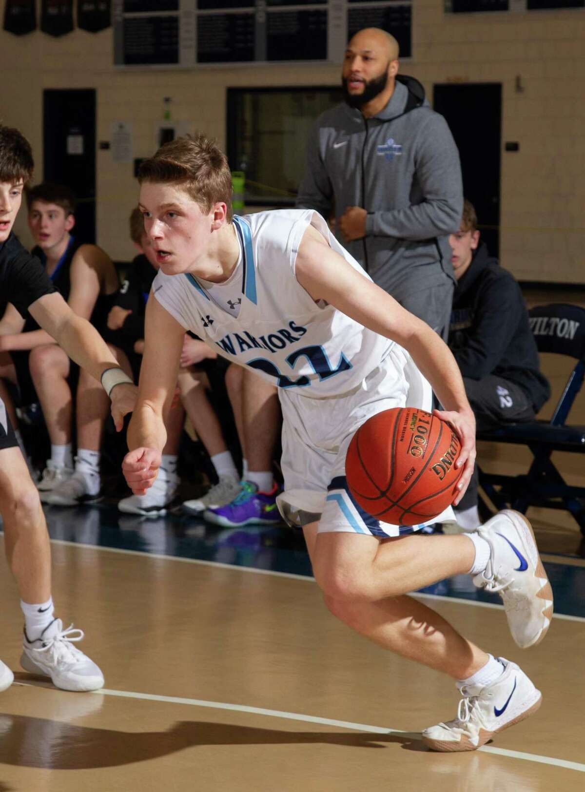 Andrew Smith (file photo) scored 18 points in Wilton’s season-ending loss to New Britain on Monday night in the Division I state tournament.