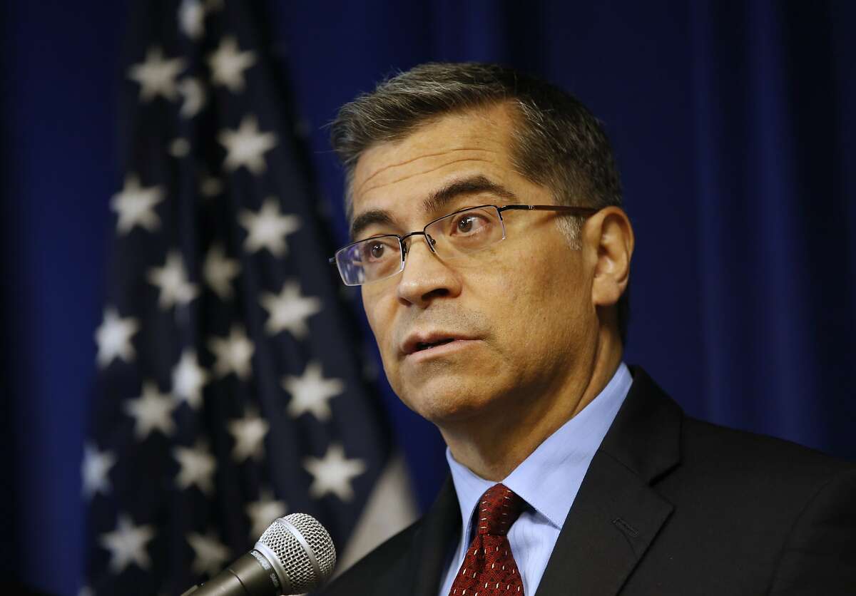 California Attorney General Xavier Becerra discusses settlements reached with 52 automobile parts manufacturers for illegal bid rigging during a news conference Wednesday, Dec. 4, 2019, in Sacramento, Calif. Becerra says the state recovered more than $23 million in the scheme that inflated consumer costs. (AP Photo/Rich Pedroncelli)