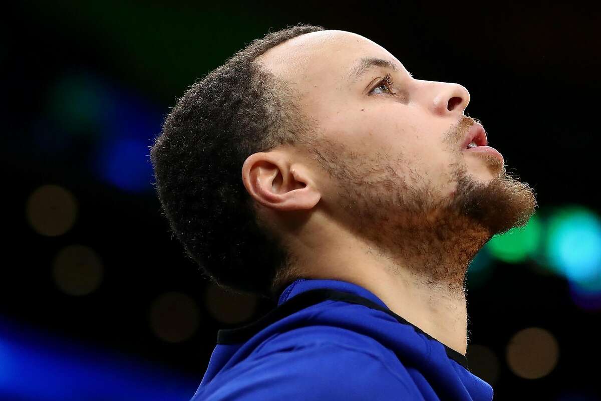 BOSTON, MA - JANUARY 26: Stephen Curry #30 of the Golden State Warriors warms up before a game against the Boston Celtics at TD Garden on January 26, 2019 in Boston, Massachusetts. NOTE TO USER: User expressly acknowledges and agrees that, by downloading