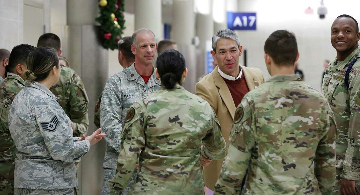 Mayor Ron Nirenberg greets military personel at the San Antonio Airport. Thousands of soldiers, sailors and airmen hit the San Antonio International Airport early Friday morning Dec. 20, 2019, to catch commercial flights home for the holidays.