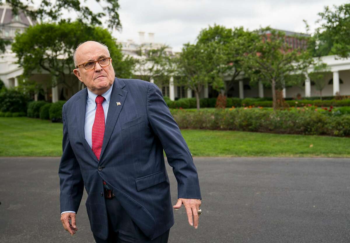 FILE -- Rudy Giuliani, President Donald Trump's personal lawyer, on the South Lawn of the White House, in Washington, May 30, 2018. Interviews with two Ukrainian oligarchs � Dmitry Firtash and Ihor Kolomoisky � as well as with several other people with knowledge of Giuliani�s dealings, point to a new dimension to his exertions on behalf of his client, President Donald Trump. (Doug Mills/The New York Times)