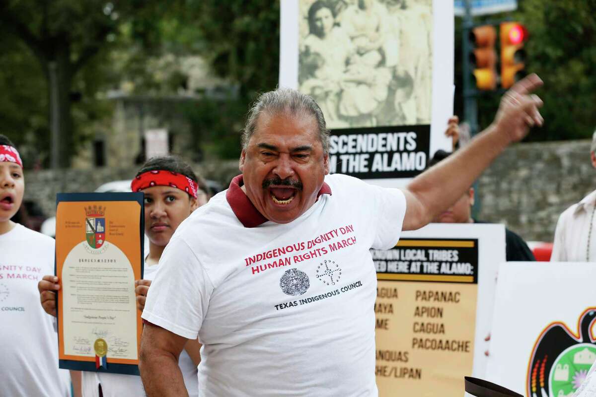 Antonio Diaz, founder of the Texas Indigenous Council, addresses the media during a press conference by the U.S. Postal Service building across the Alamo, Monday, Oct. 14, 2019. The group was expressing concerns over the remains found at the Alamo.